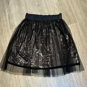 Sequin skirt with tulle overlay. Great for parties!